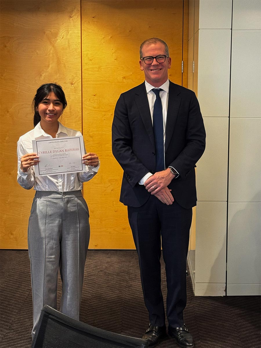 Cyrille R. Year 12 student with UBS representative