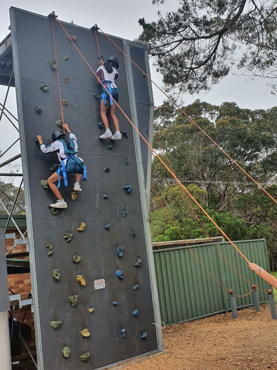 Two students Rock Climbing at Catherine McAuley Westmead's Year 7 Activity Day
