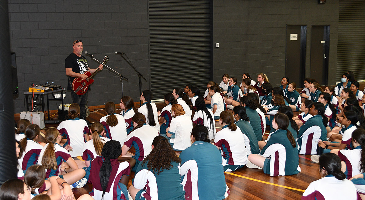 Mr Chris Doyle from Karis Ministries performing to Year 8