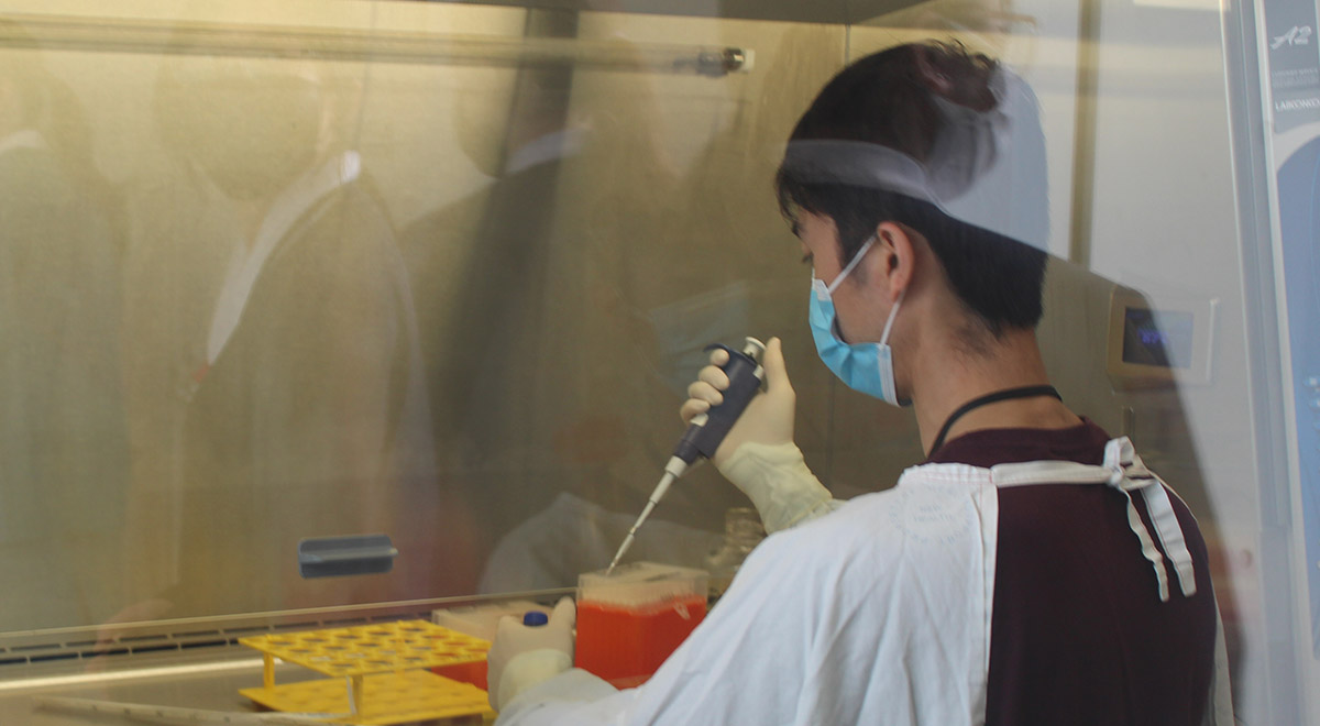 A photo of a researcher in the laboratory