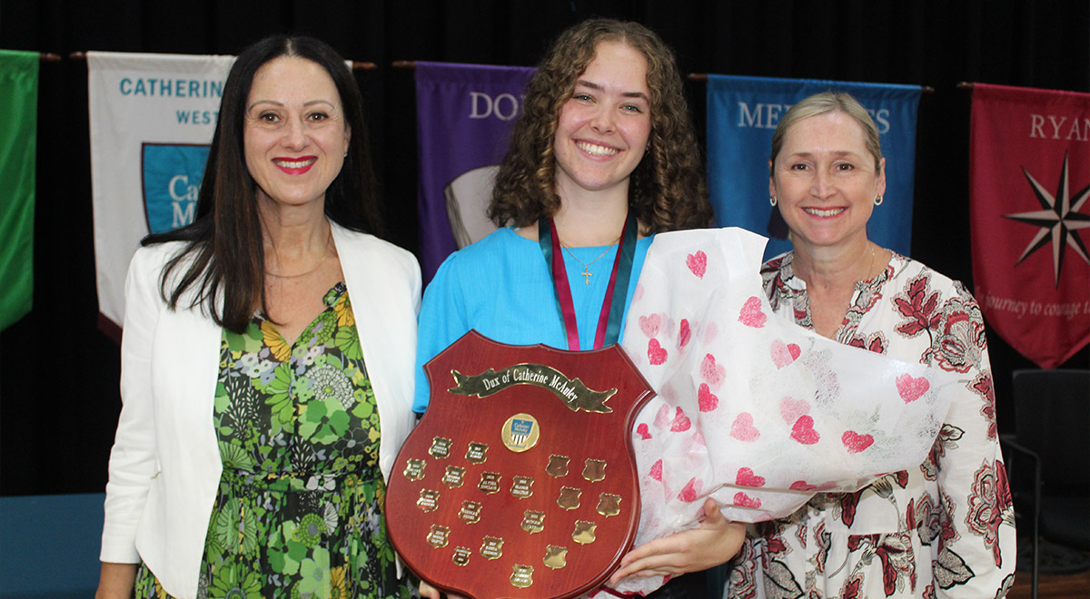 Victoria is shown with on left School Principal Ms Mary Refalo and on right Year 12 2022 Leader of Learning Wellbeing Mrs Louise Beadman. McAuley Westmead