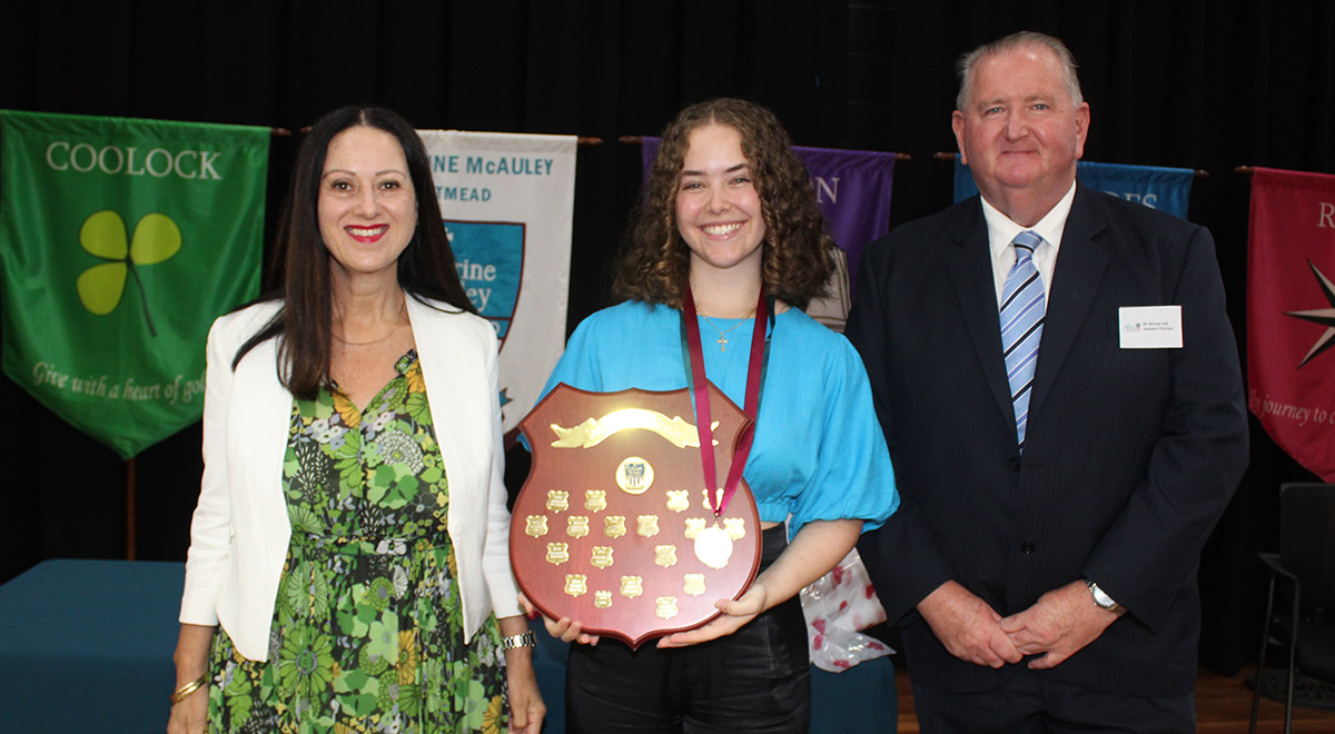 McAuley Westmead School Dux on stage with Principal Mary Refalo