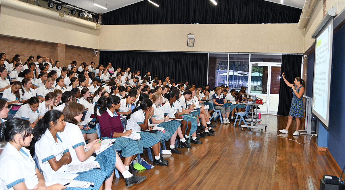 Dr Prue Salter, from Enhanced Learning Educational Services, with some Year 9 students after their study skills session | McAuley Westmead