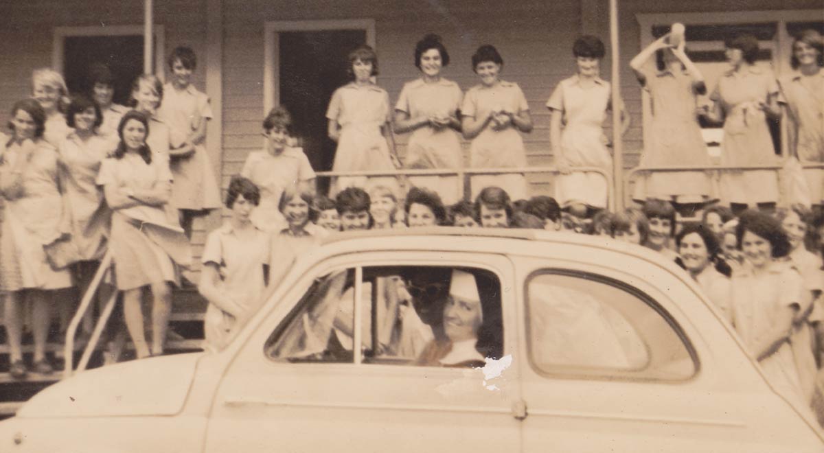 School Principal Sr Eugene Dobson with 4th Form students at the demountables in early 1966