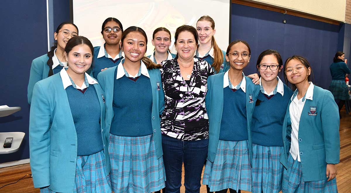 Catherinee McAuley Westmead students posing for a photo with Dr Prue Salter