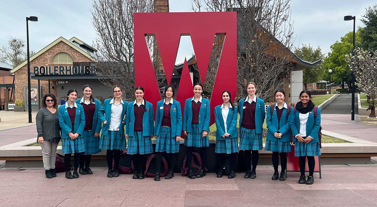 Students at the Western Sydney University Sustainable Futures Hackathon with Mrs Xuereb, Leader of Learning Pathways and Partnerships on left