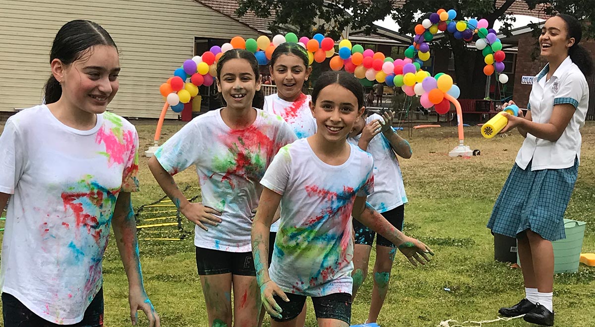 Catherine McAuley STEM Club students helped Sacred Heart Primary students with STEM activities at their Colour Run fundraiser