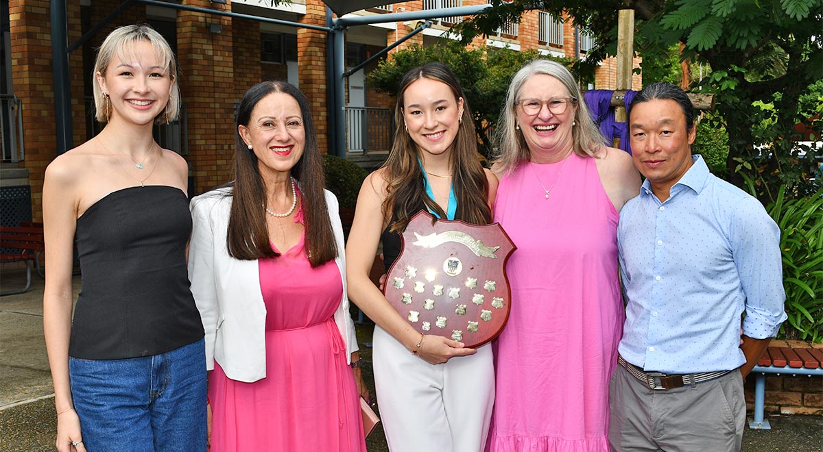 Claudia Nguyen was announced as the Dux for 2023. Shown with her family and School Principal Ms Refalo