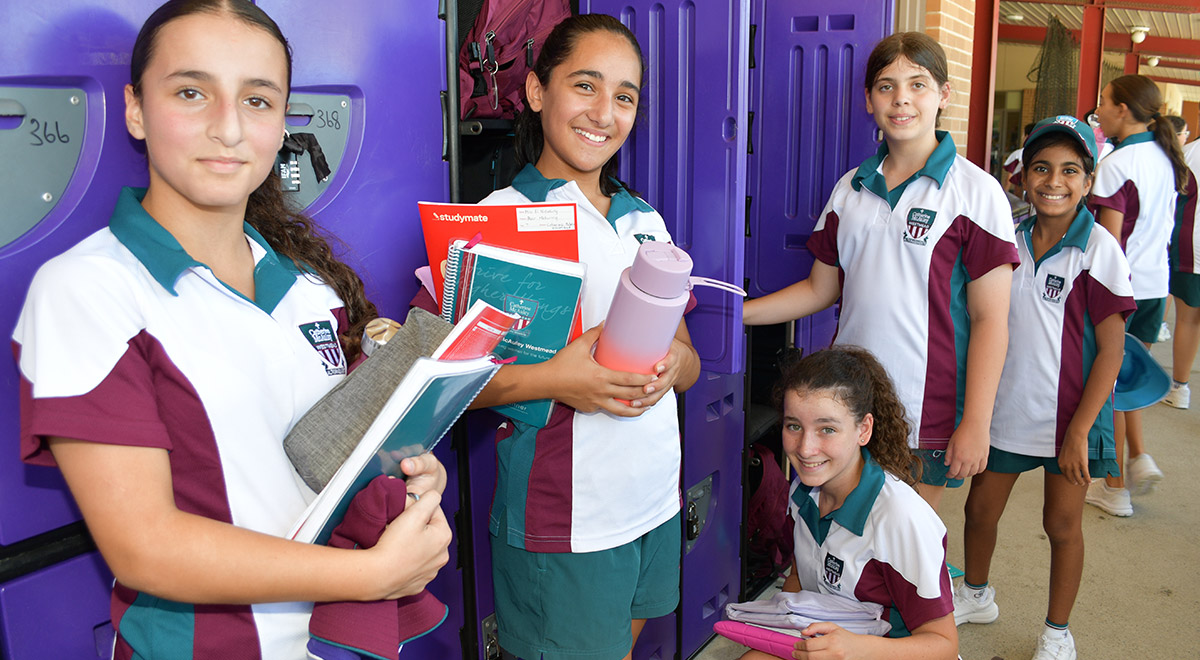 2024-Catherine McAuley Peer Mentors helping with Lockers