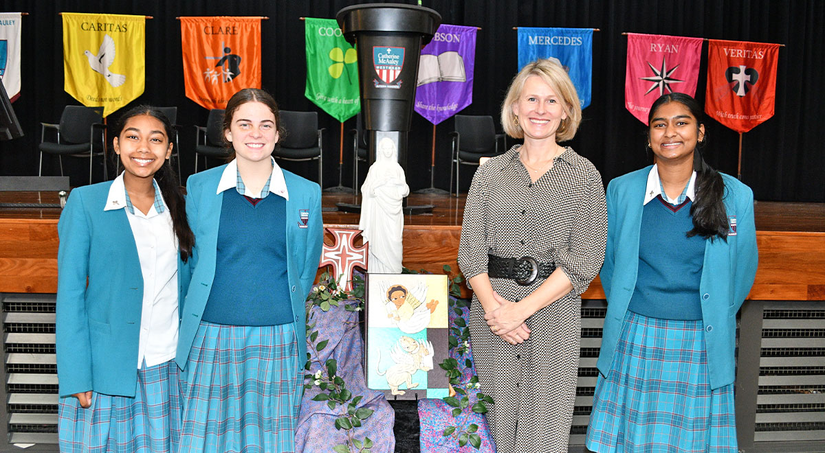 Julia Fleming, Education Officer, Women’s Community Shelters, with Mercedes, Clare and Ryan House Leaders.