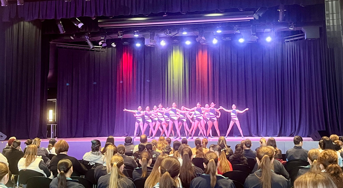 McAuley Dance students on stage mid performance