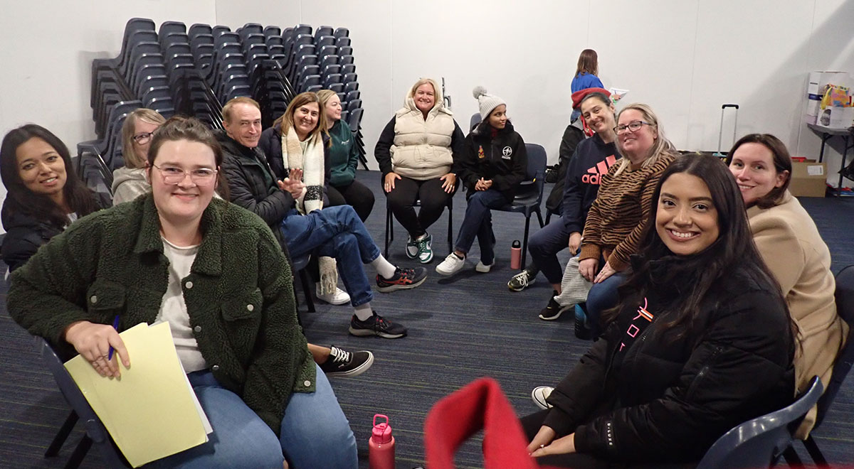 McAuley Westmead students sitting in a circle and talking at retreat