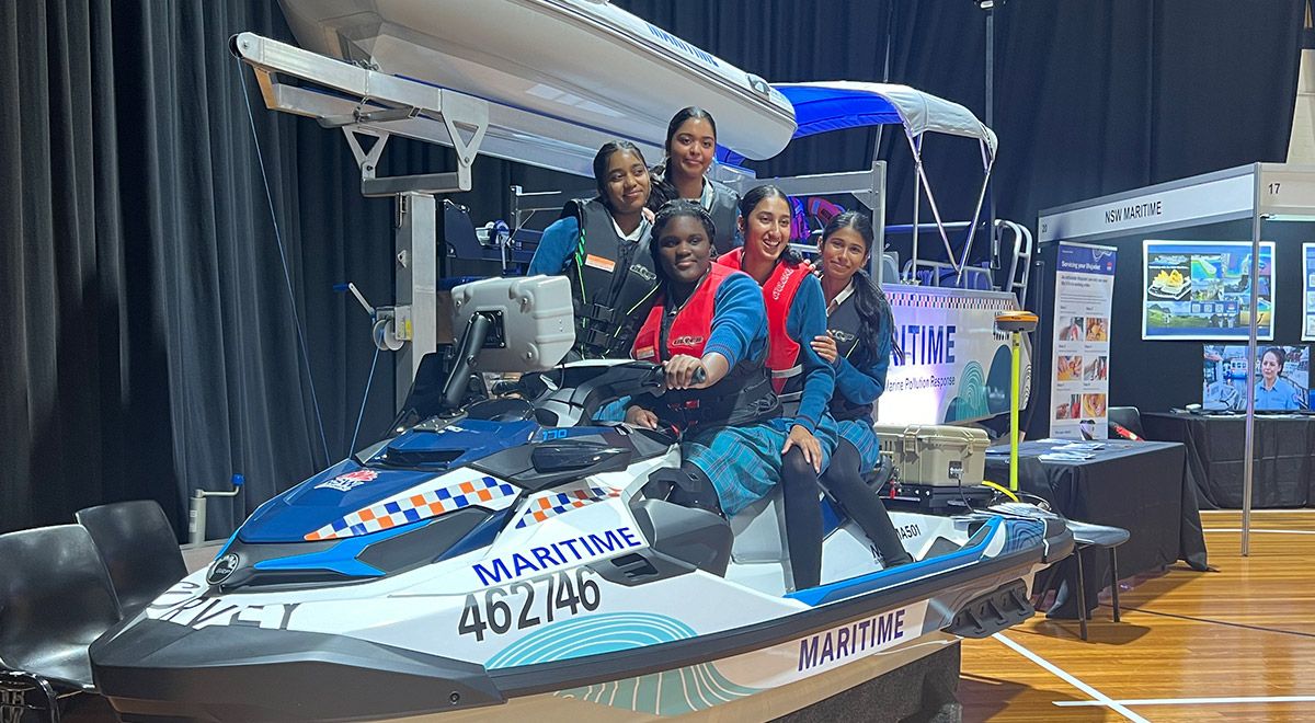 McAuley Westmead studnets wearing life jackets, while sitting on a jet ski