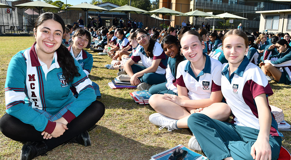 Year 12 Senior student with Year 7 students