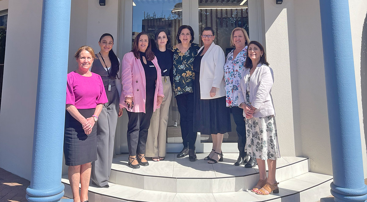 Mrs Marina Kazzi, who is leaving the school after 28 years, with Catherine McAuley Westmead support staff