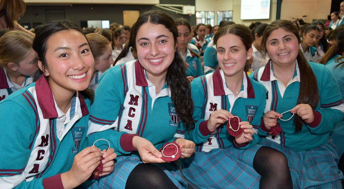 The Year 12 students were presented with a bracelet as their graduation gift from the school.