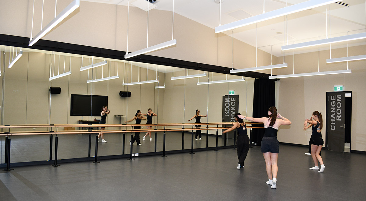 The new dance studio at Catherine McAuley westmead. A few students are dancing.