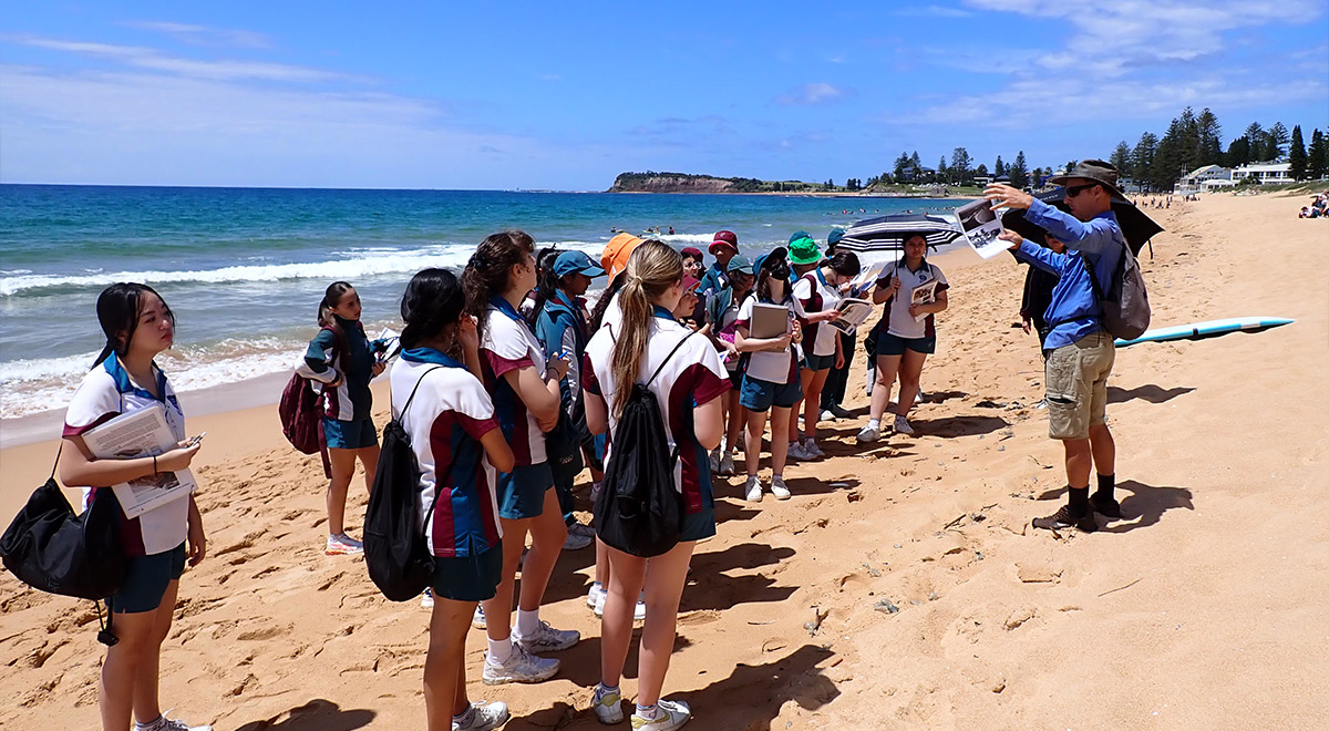 Catherine McAuley Westmead students spread out across Collaroy Beach