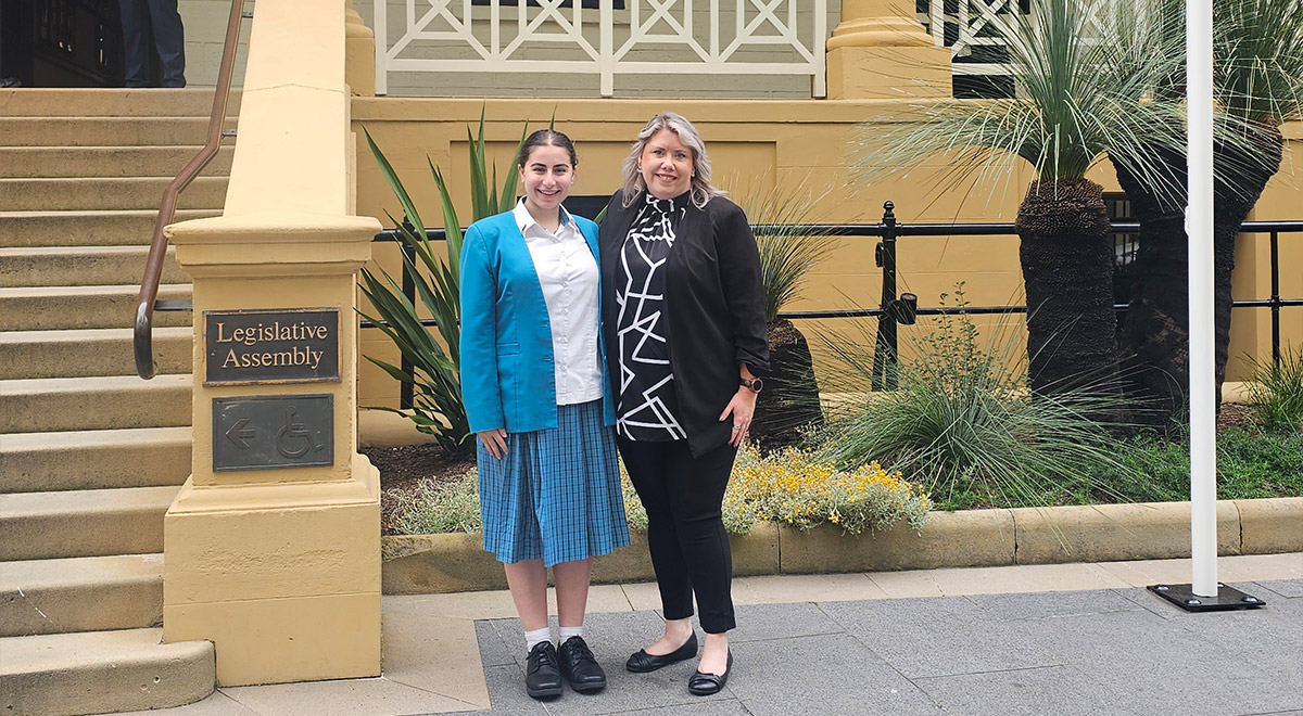 Catherine McAuley student and teacher, Georgia S. and Ms Spelman, out the front of NSW legislative assembly