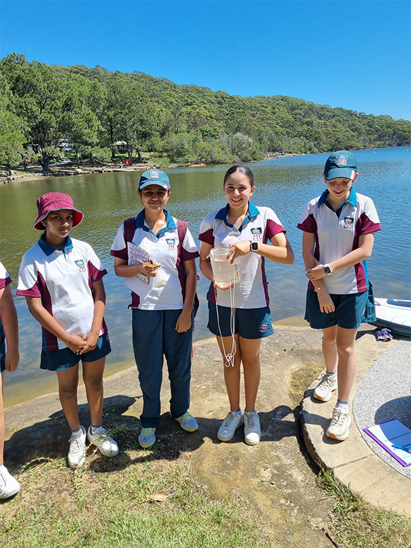 Year 8 Catherine McAuley Westmead students hand reel fishing at the Manly Dam Reservoir.