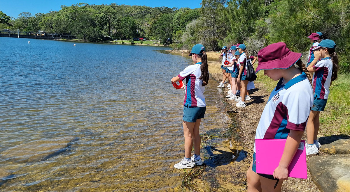 Year 8 Catherine McAuley Westmead students hand reel fishing at the Manly Dam Reservoir.