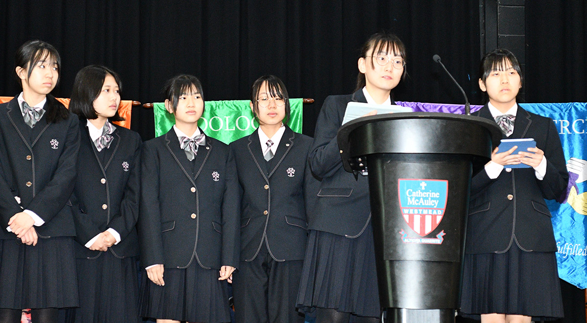 Students from Iida Girls School speaking at the school assembly.