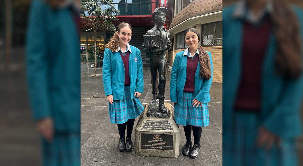  Angelina N. and Holly G. standing by the statue of James Martin outside of Parramatta Library