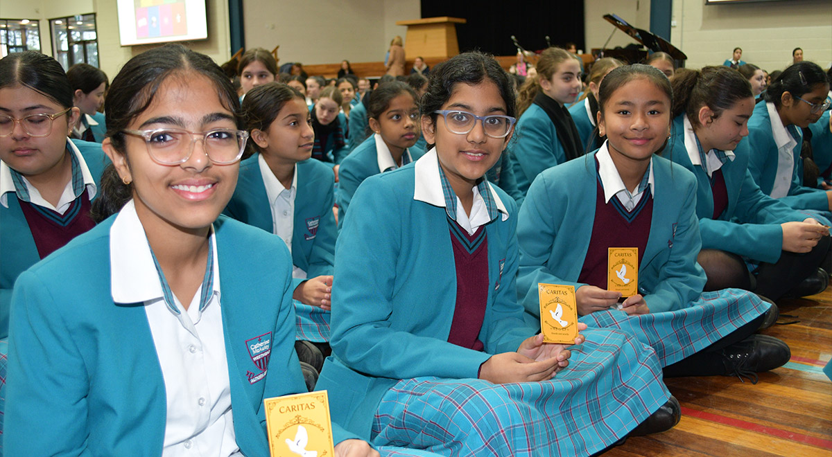 Yr 7 Caritas with their House prayer cards