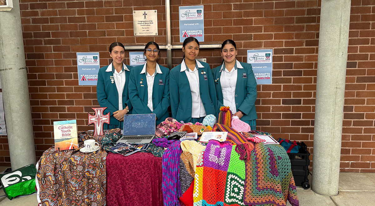Year 10 Catherine McAuley Westmead students showcasing the school's work for The Parramatta Women's Shelter.