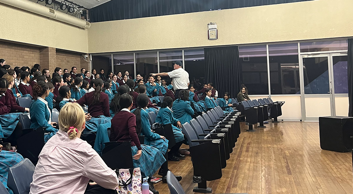 Photo of Drama Incursion. The actor is in the stands with the students.
