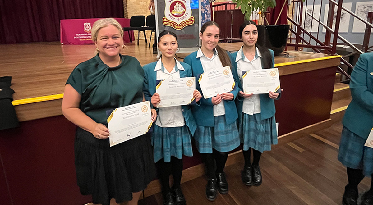 VET Business Services Teacher Mrs Taryn Grima with Year 12 Business Services students.