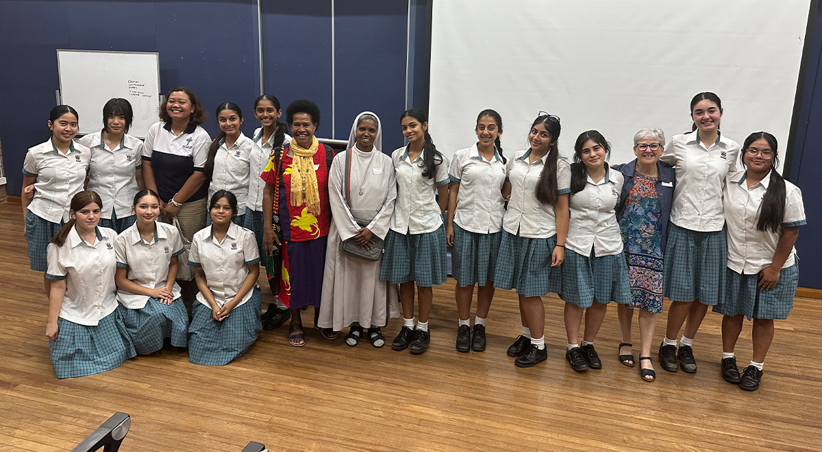 Executive Director of Mercy Works, Sr Sally Bradley RSM along with international visitors and Year 9 religion students