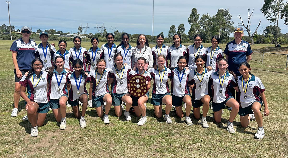 The McAuley Cricket Teams with School Principal Ms M. Refalo after the final game.