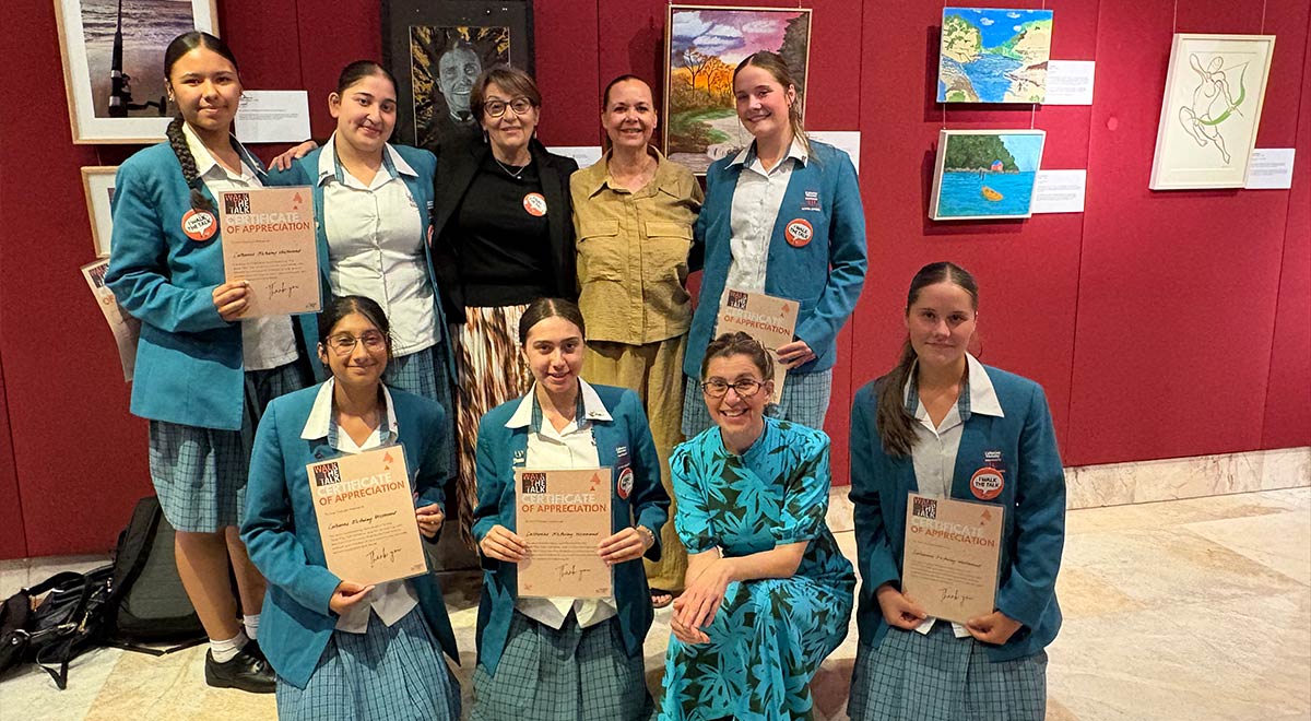 Dannielle Miller OAM, Director of Education, Women’s Community Shelters and ex-student of Catherine McAuley, with Year 10 students who attended the awards ceremony.