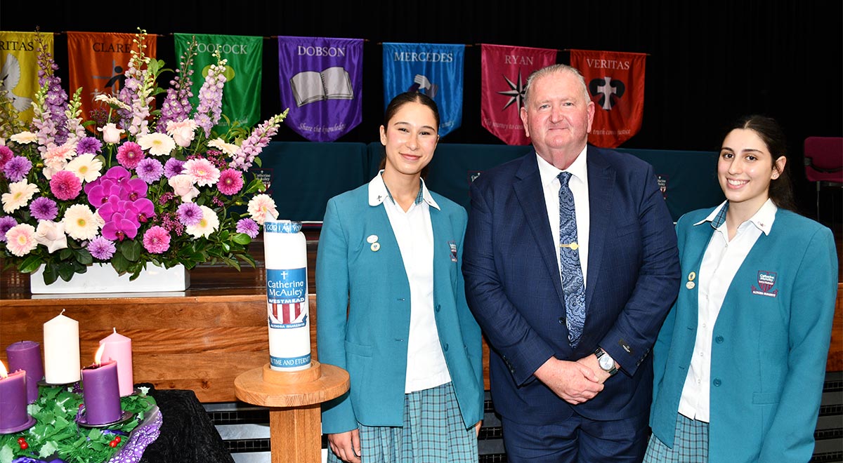 Michael Hall, retiring Assistant Principal with School Captains Lara and Talia.