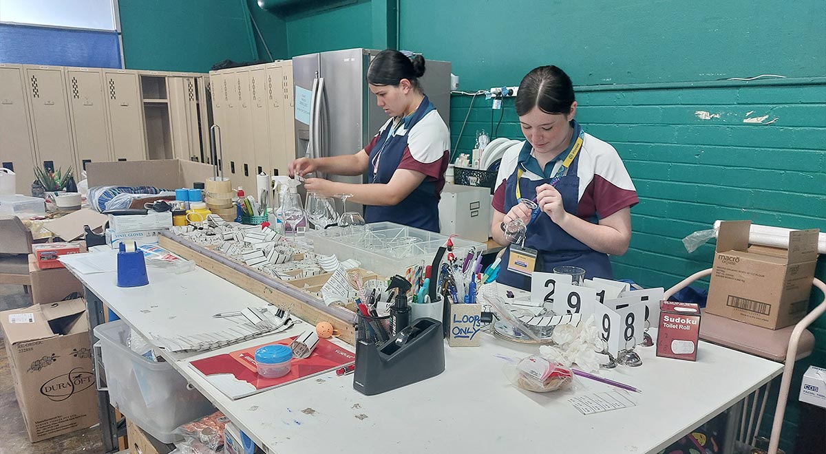 Catherine McAuley Westmead students cleaning donated glasses