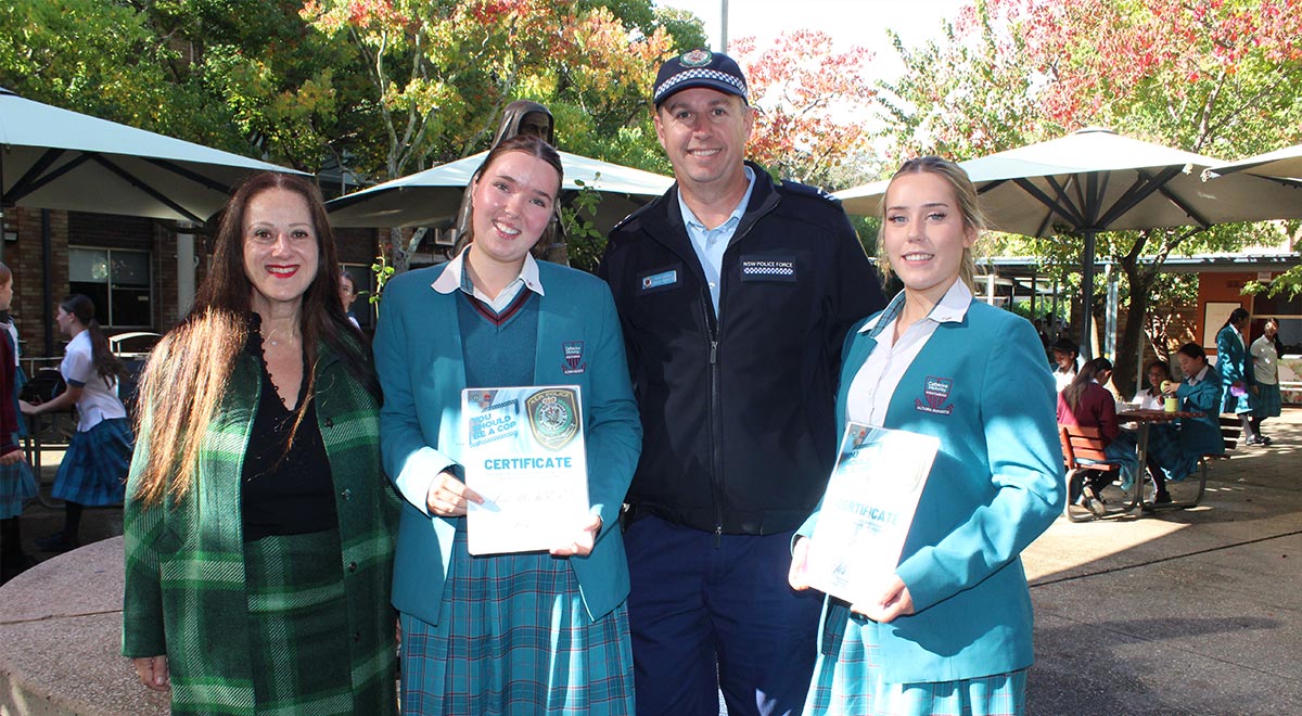 Ms M.Refalo, Police Youth Liaison Officer Senior Constable Brad Martin, Ava M. and Stella R. presented with their certificates