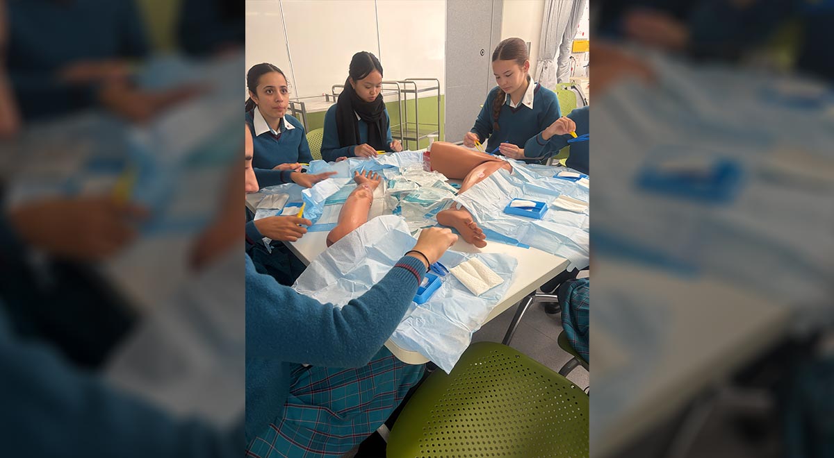 Students practising wound dressing techniques at the UTS School of Nursing and Midwifery