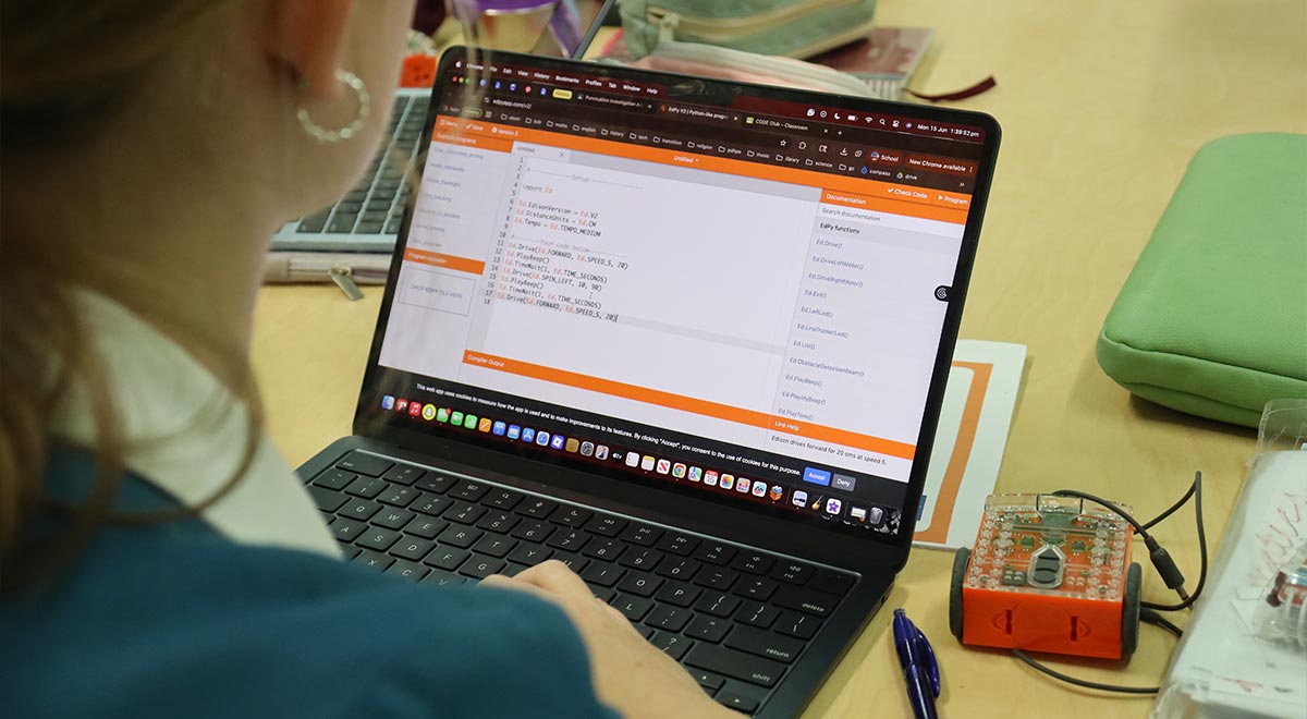 Year 7 students programming the Edison robots