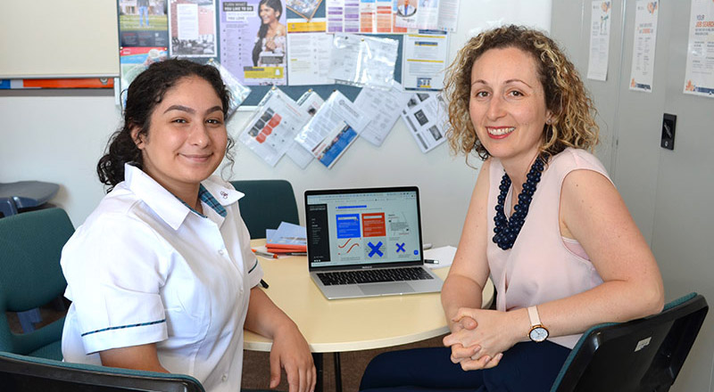 Happy student discussing career options with Careers Advisor at Catherine McAuley Catholic College Westmead