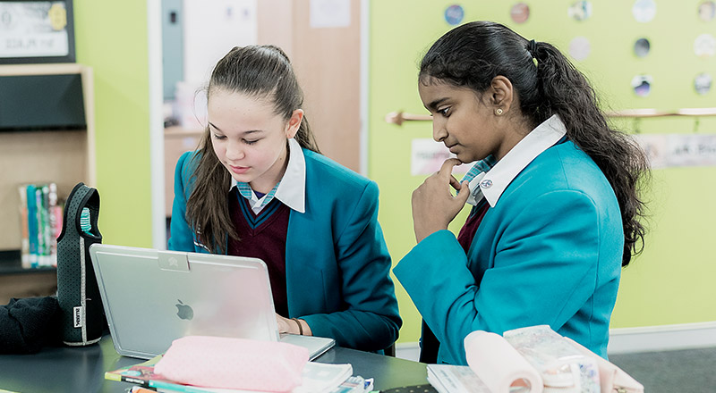 Catherine McAuley Catholic College Westmead students using learning devices
