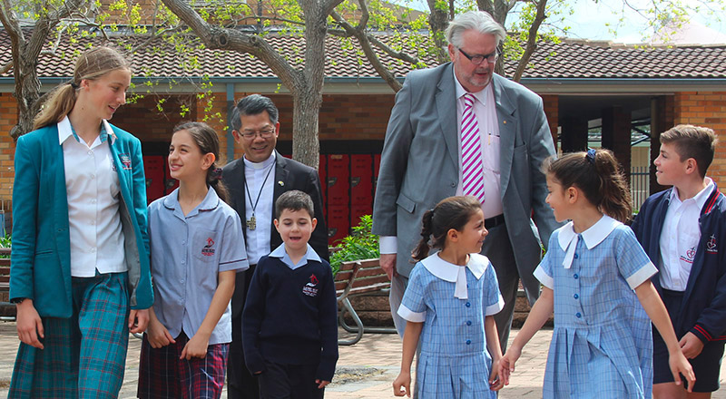 Bishop Vincent Long and former CSPD Executive Director at Catherine McAuley Catholic College Westmead