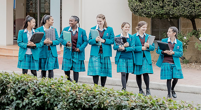 Catherine McAuley Catholic College Westmead girls in school courtyard