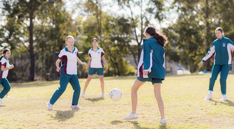 Catherine McAuley Catholic College Westmead students playing soccer