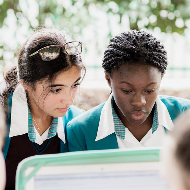 Two Catherine McAuley Catholic College Westmead girls studying